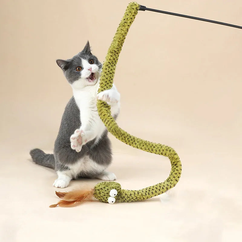 Long green snake cat teasing stick toy with feather end for cat play.