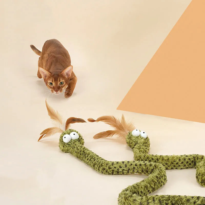 Long green snake cat teasing stick toy with feather end for cat play.