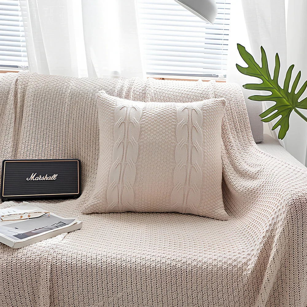 Handmade Nordic wool knit pillowcase with fringe edges measuring 45x45cm in light coffee colour