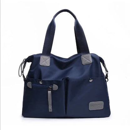 Versatile ladies handbag in various colors with multiple carry options, including handbag, shoulder bag, and crossbody styles, featuring durable construction and organizational pockets.
