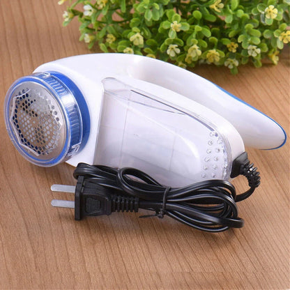 White and blue electric lint remover with stainless steel cutter for fabric pill removal