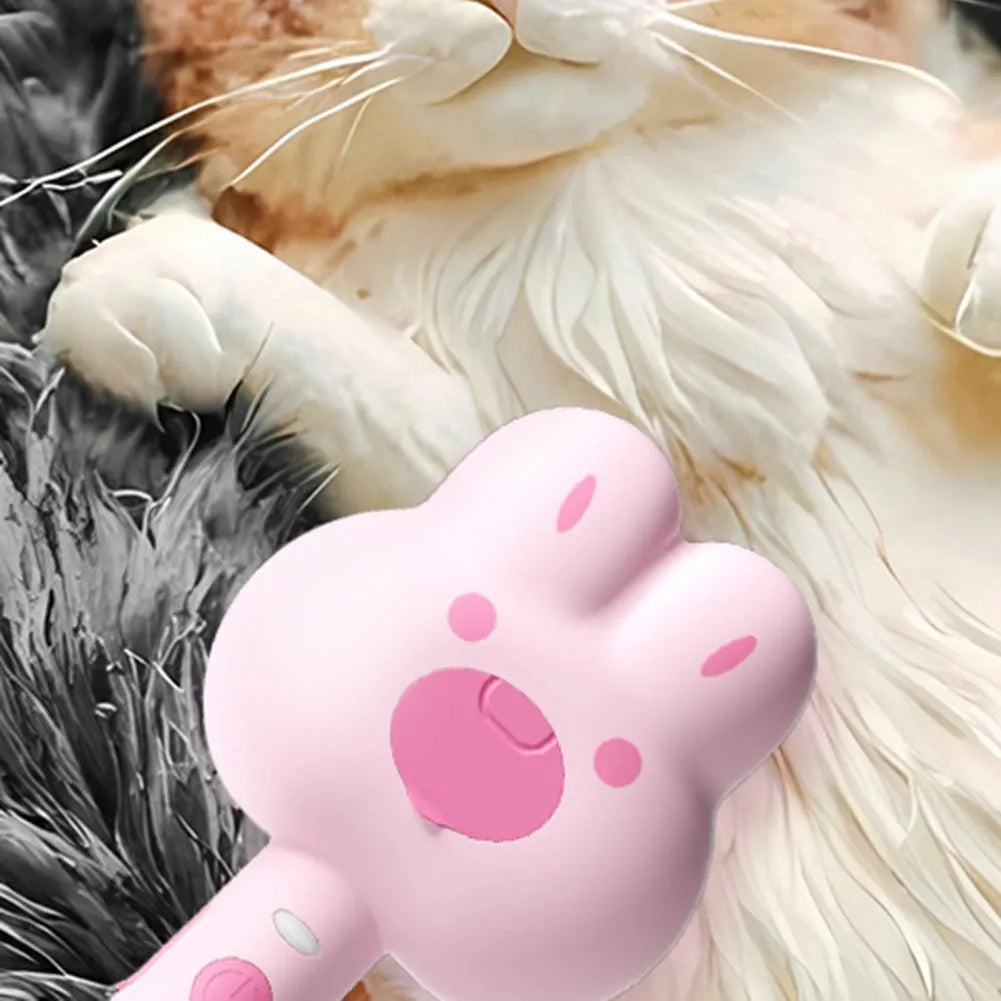 Rechargeable cat grooming comb with steam function in cartoon design, showing long handle and brush head