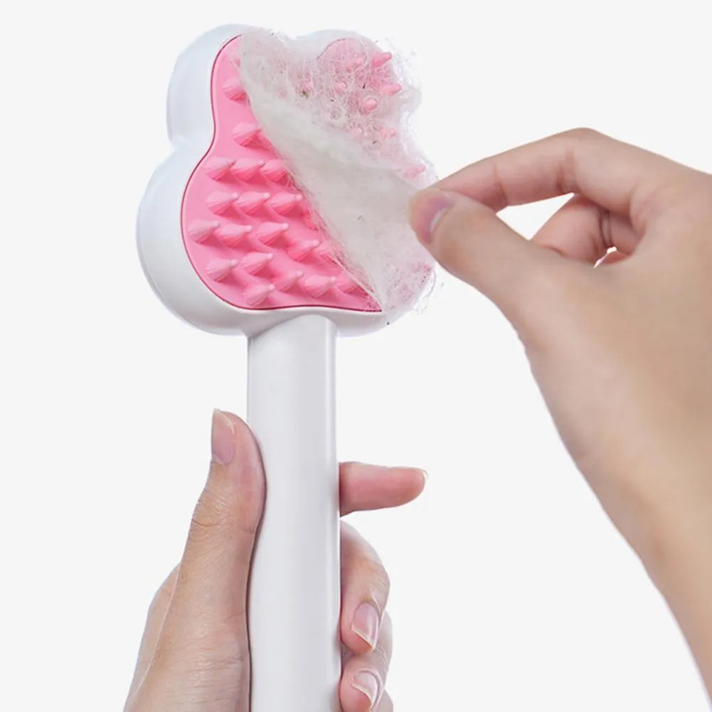 Rechargeable cat grooming comb with steam function in cartoon design, showing long handle and brush head