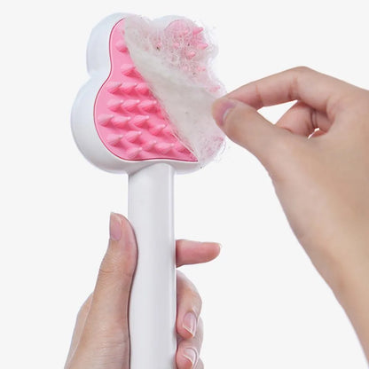 Rechargeable cat grooming comb with steam function in cartoon design, showing long handle and brush head