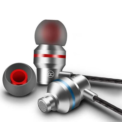 Wired in-ear headphones with microphone in black, showing 3.5mm plug and silicone ear tips.