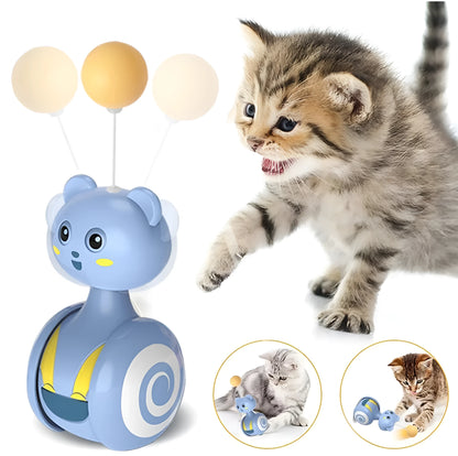 Blue cat feather wand toy with rotating ball attachment on bumbler tumbler base