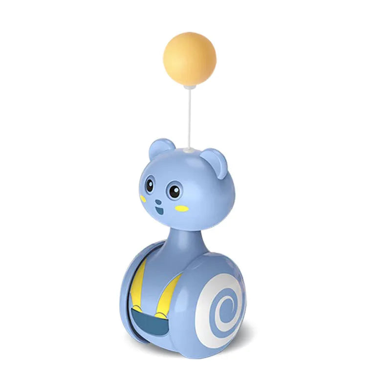 Blue cat feather wand toy with rotating ball attachment on bumbler tumbler base