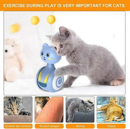 Blue cat feather wand toy with rotating ball attachment on bumbler tumbler base