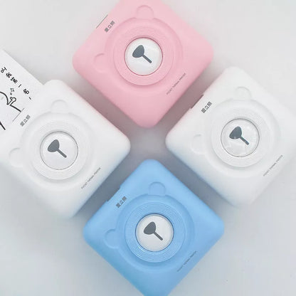 Portable Handheld Label Mini Thermal Printer in white, pink, or blue