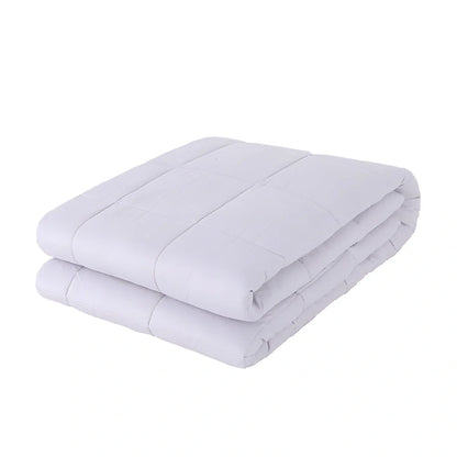 Weighted blanket with quilted compartments containing glass beads, available in dark grey, light grey, and navy colours