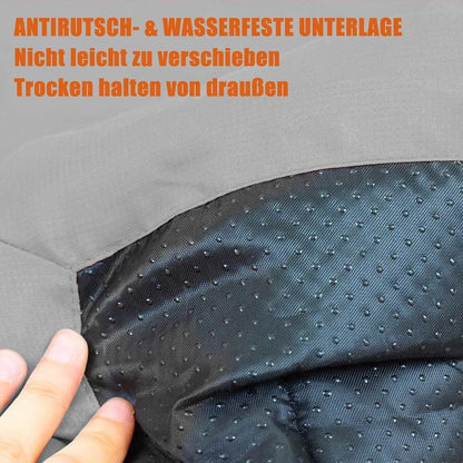 Blue foldable outdoor dog bed shown both open and folded with nylon buckles, on a grassy background.