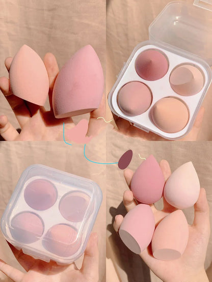 Four synthetic sponge makeup eggs in grape, mango, mint, and peach peach colours