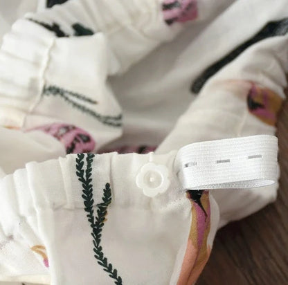 Traditional maternity pajama set with 100% cotton batik fabric, ankle-length trousers, and full-length bell sleeves