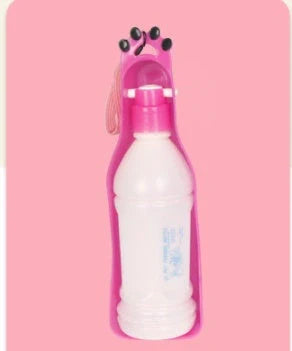 Portable Pet Cup Drinker in pink with 600ML capacity, featuring one-hand operation for easy use.