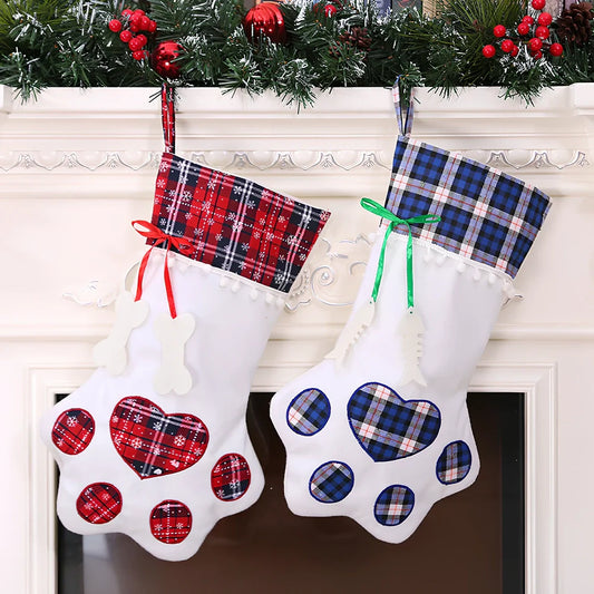 Red dog paw shaped Christmas stocking measuring 20cm by 46cm with reinforced hanging loop