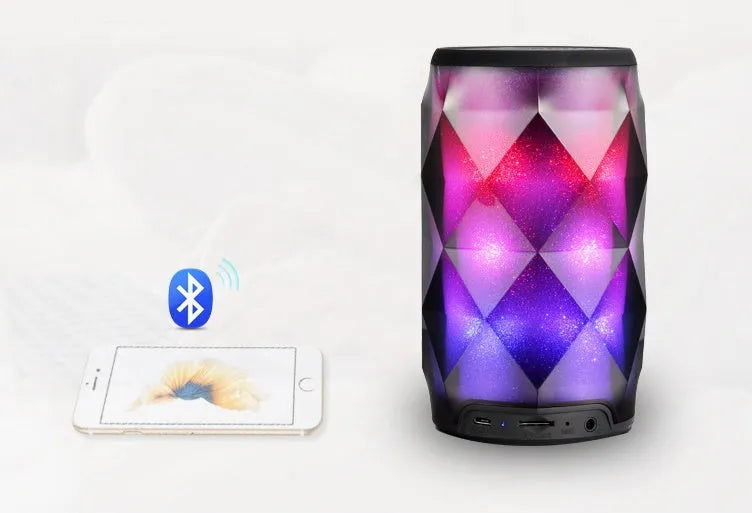 Black crystal diamond-cut Coke can shaped Bluetooth speaker with colourful starry sky LED lighting.