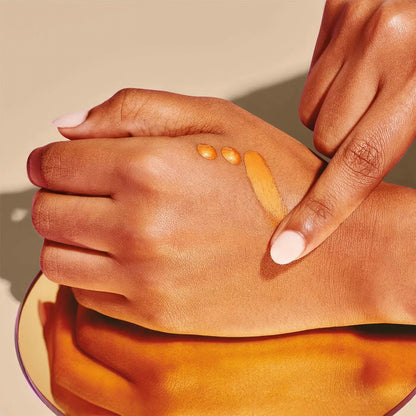 PHOFAY Body Shimmer Oil bottle with shimmering liquid inside, 25 ML size