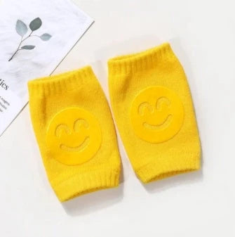 Cozy knee pads in various colors designed to protect babies during crawling with a non-slip, stretchy fit