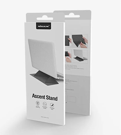 Blue or grey foldable laptop cooling stand with anti-slip surface on a desk.