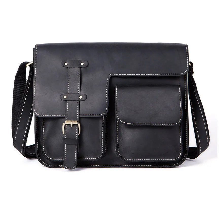 Leather vintage messenger bag in black with adjustable crossbody strap and brass buckle