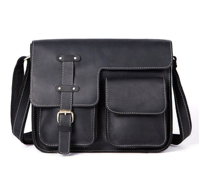 Leather vintage messenger bag in black with adjustable crossbody strap and brass buckle