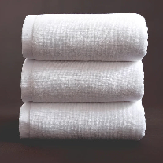 White hotel bath towel with thickened 100% cotton construction showing texture detail