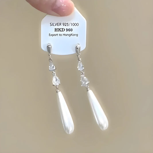 Geometric star-shaped alloy ear clip with rhinestones and hanging tassels for women