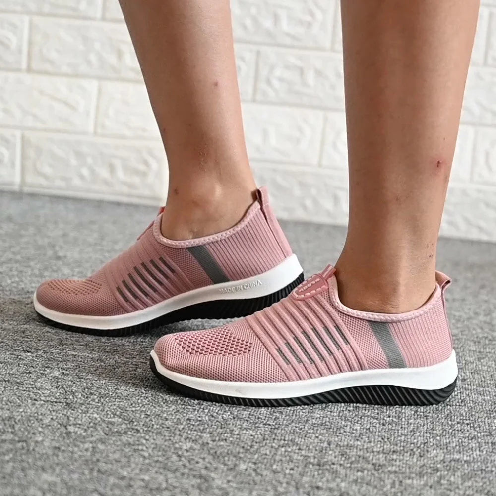 Women's summer breathable mesh shoes in red, black, and pink with flat heel