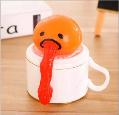 Gudetama Vomiting Egg Toy in green, orange, pink, and yellow for stress relief and fun