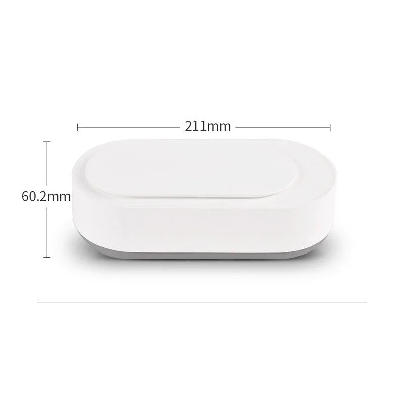 White portable ultrasonic cleaner with stainless steel tank for cleaning jewellery and glasses