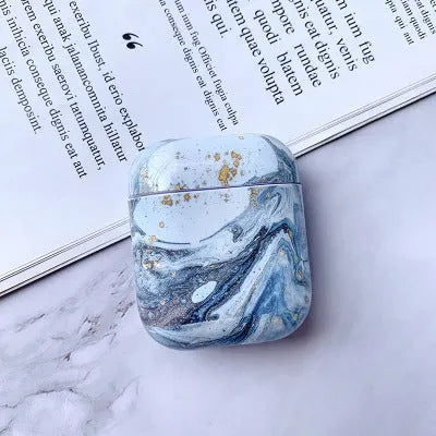 White marble hard PC protective case for AirPods charging box showing scratch protection