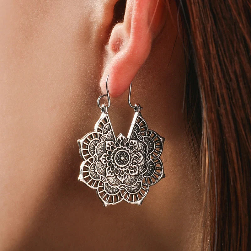 Vintage floral openwork metal earrings showcasing ethnic style and elegance