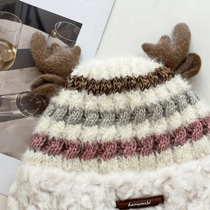 Cozy knit Christmas hat with playful deer antler design in various festive colors