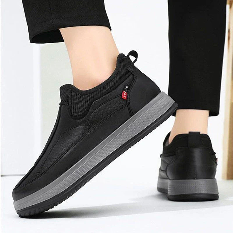 Cozy winter snow boots with fleece lining, round toe, and non-slip platform sole in black and grey colors
