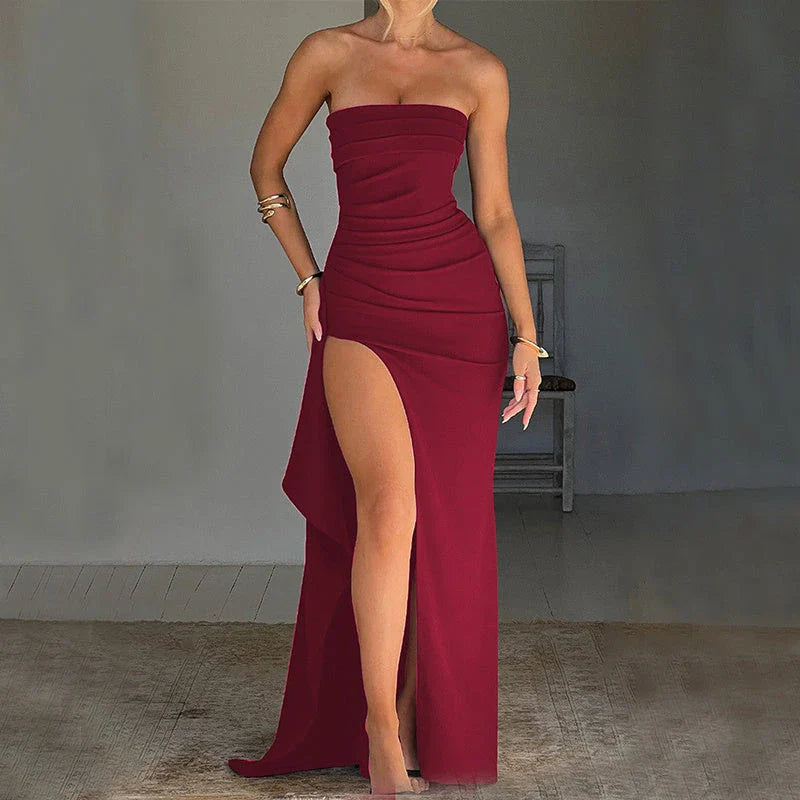 Backless pleated maxi dress in various colors, featuring high-waisted silhouette and unique design