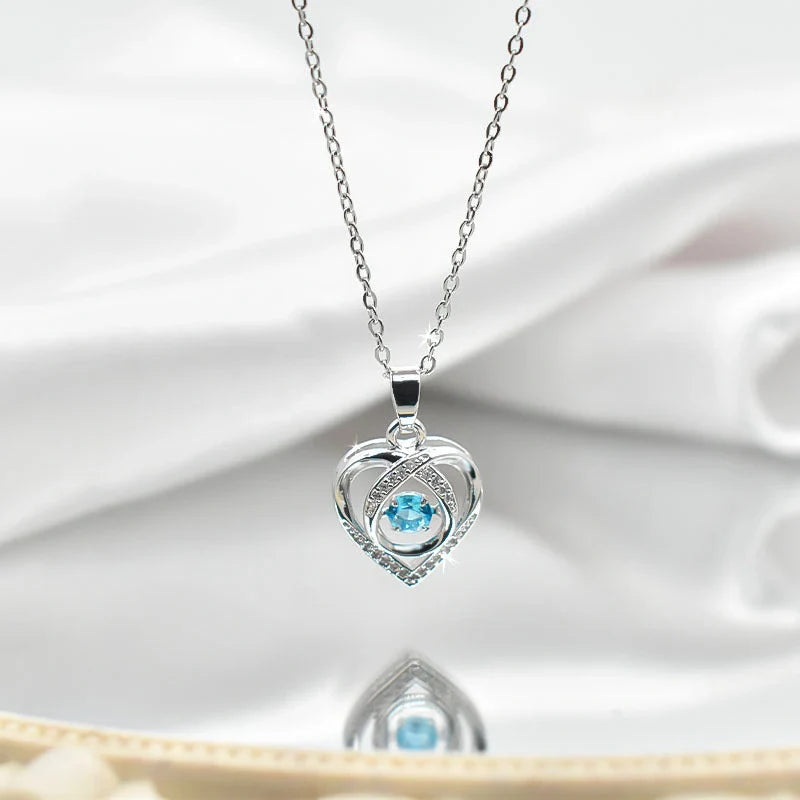 Elegant, rhinestone-encrusted heart-shaped necklace with adjustable chain and clasp