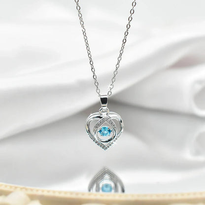 Elegant, rhinestone-encrusted heart-shaped necklace with adjustable chain and clasp