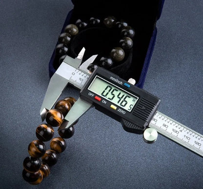 Silver stainless steel digital vernier caliper 0-150mm with large LCD, IP54 waterproof and oil proof, metric and imperial conversion.