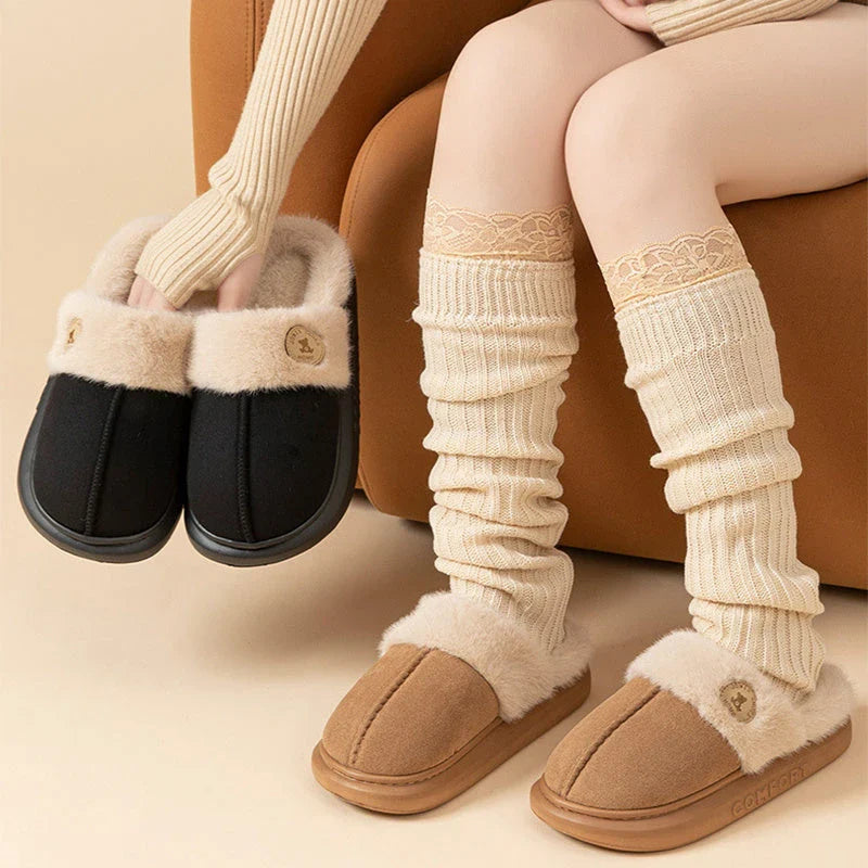 Cozy fleece-lined slippers in various colors, featuring a plush lining and non-slip PVC sole for indoor and outdoor wear