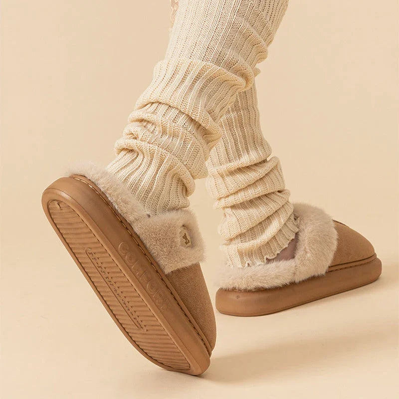 Cozy fleece-lined slippers in various colors, featuring a plush lining and non-slip PVC sole for indoor and outdoor wear