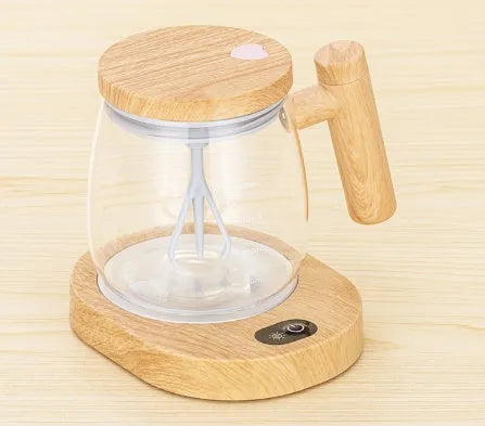 Clear borosilicate glass self-stirring coffee mug with 400ml capacity and electric mixing button
