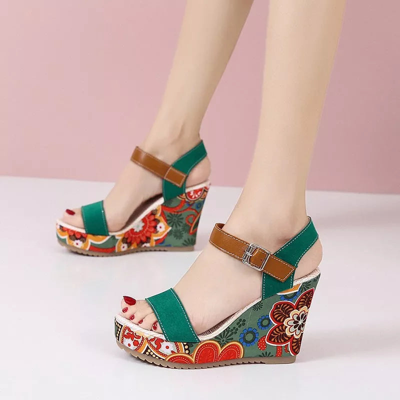 Women's floral embroidered high wedge sandals with buckle strap in black, green, and orange