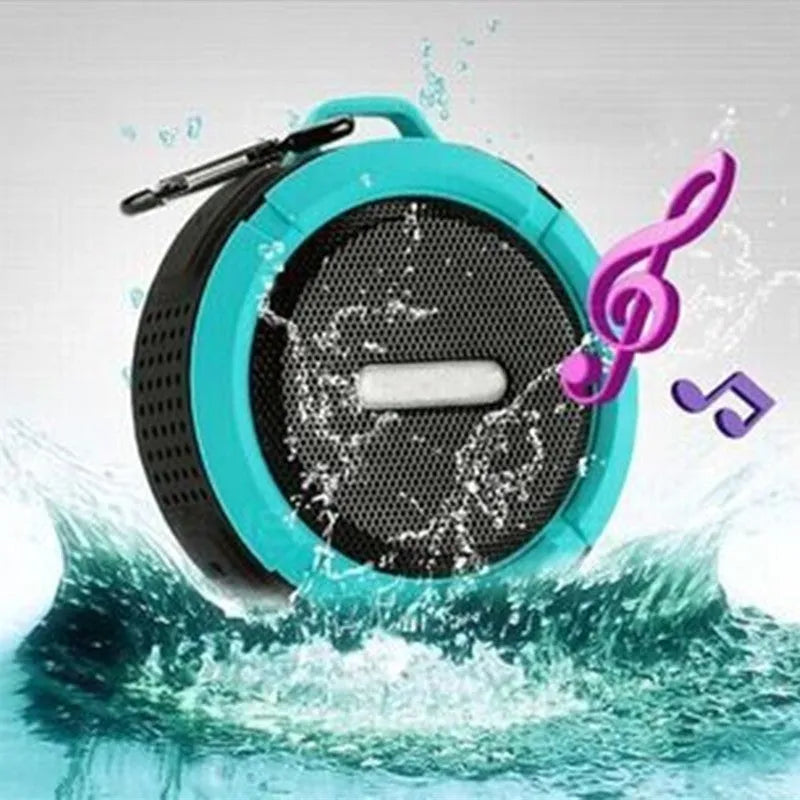 Portable wireless Bluetooth stereo C6 outdoor mini speaker box with 500mAh lithium battery, waterproof IP rating, 10-30 metre range, 3W output power, TF card support, and clip for bag attachment in black, blue, green, red, or yellow colour