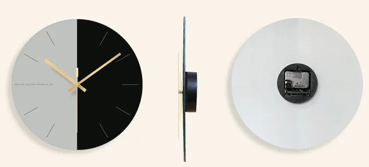 A large, clear tempered glass wall clock with a minimalist transparent face on a light background.