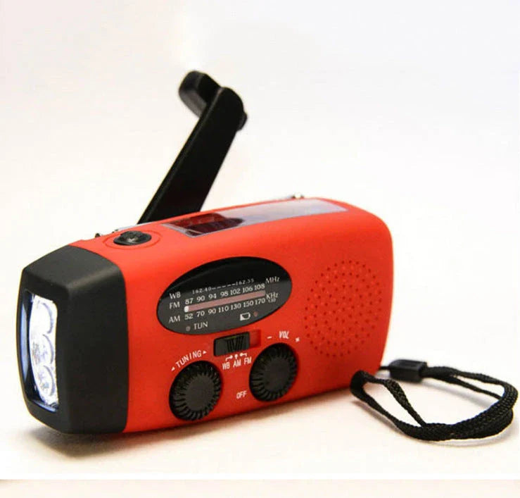 Powerful solar-powered radio and flashlight with hand crank and USB charging capabilities