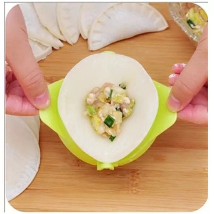 Plastic dumpling maker device in blue, green, and white for quick, uniform dumplings
