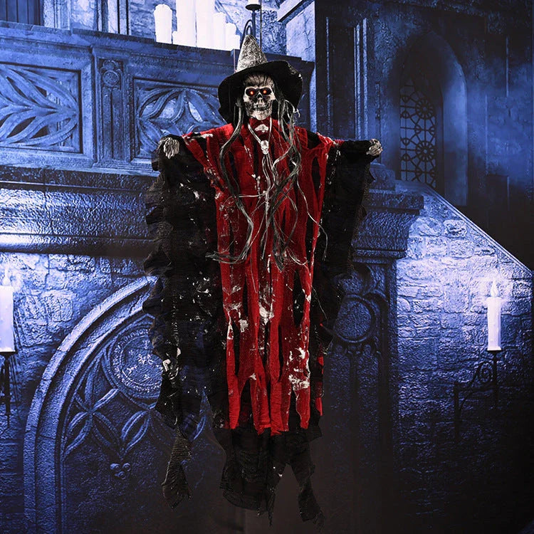 A spooky hanging skeleton ghost decoration with a chilling howl and flashing red eyes