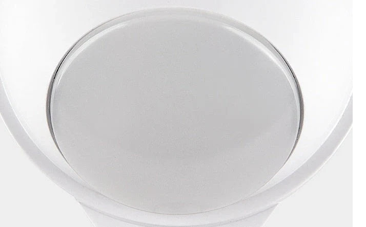 A versatile LED motion sensor night light with a 360-degree rotating head, perfect for illuminating any space in your home or office.