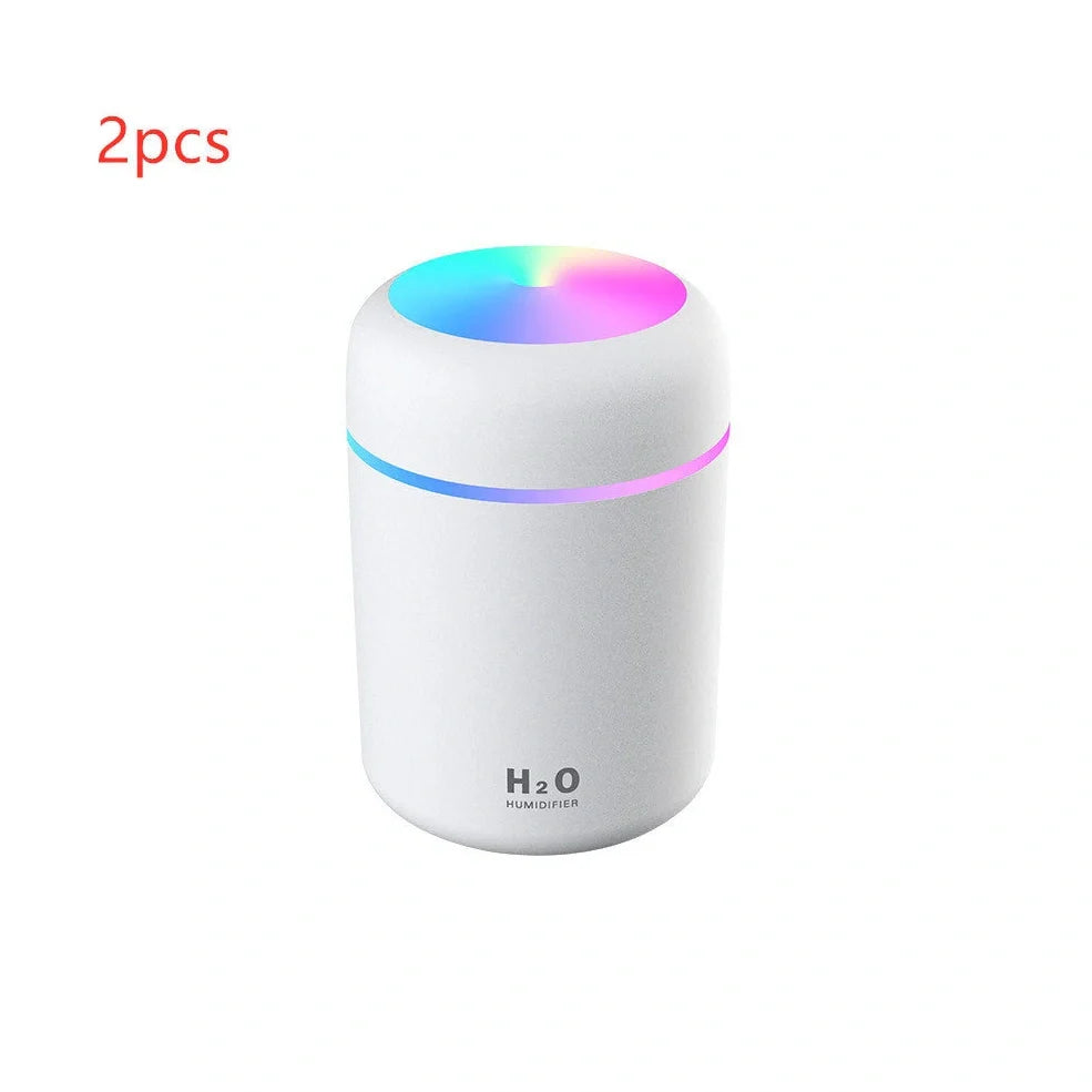 Compact USB car humidifier with colourful LED light and 300ml water tank for vehicle use