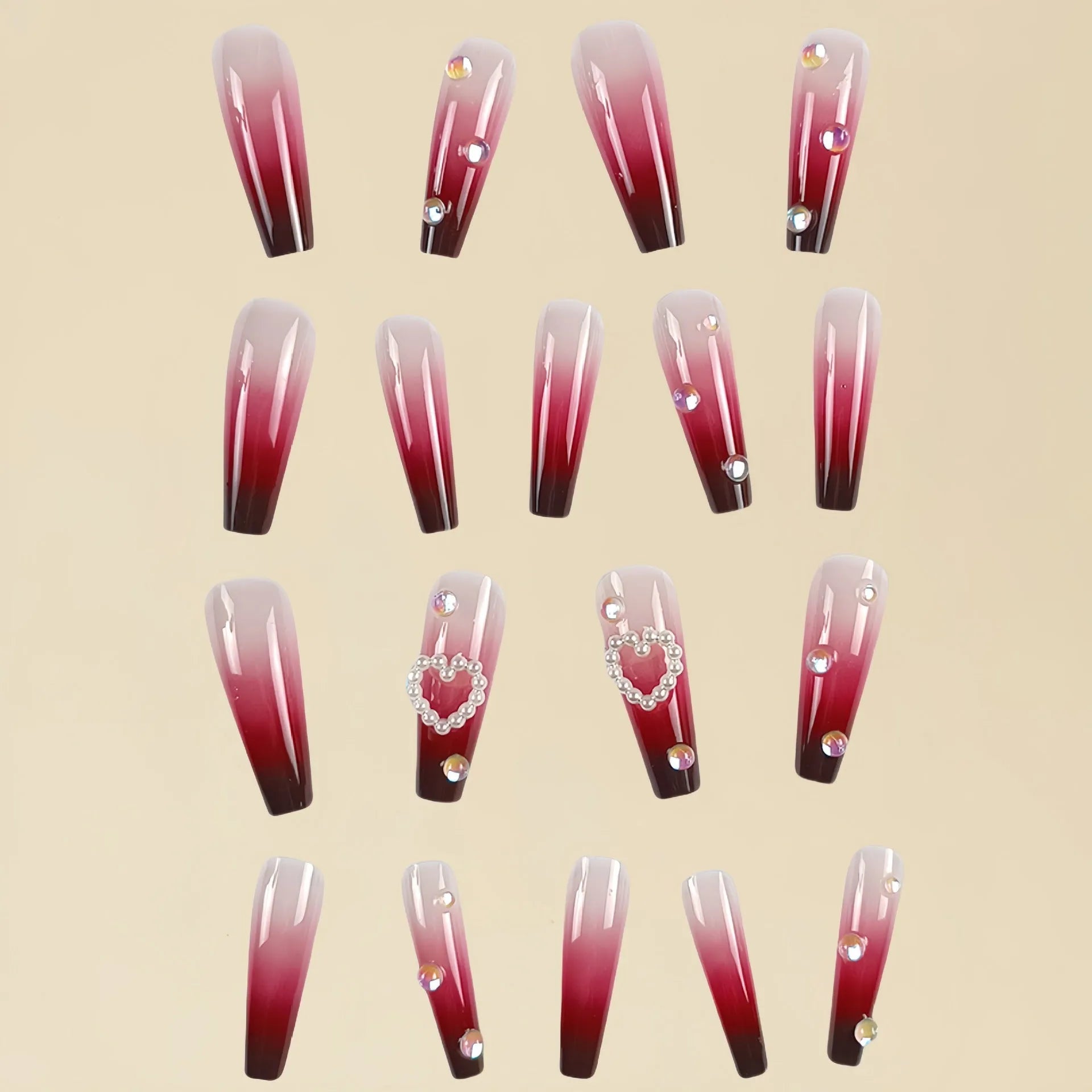 Set of long ballet-style fake nail tips with wine red gradient, white plaid pattern, and pearl heart decorations